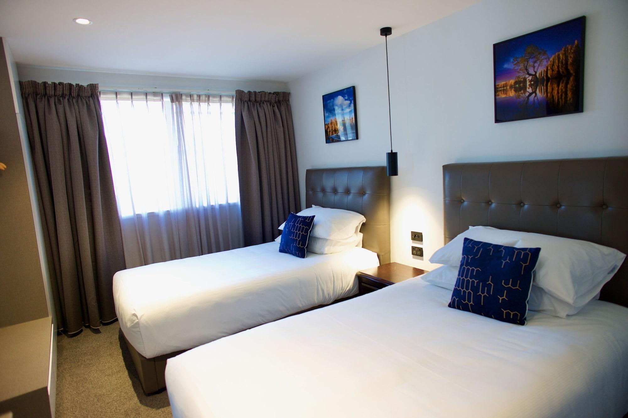 Regal Palms Resort Rotorua Exterior foto A typical bedroom at the hotel